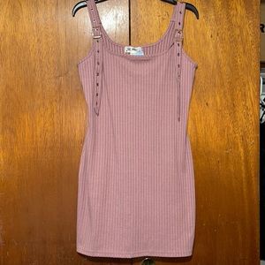 Fitted bodycon mini dress. Stretchy material. Comfortable material.